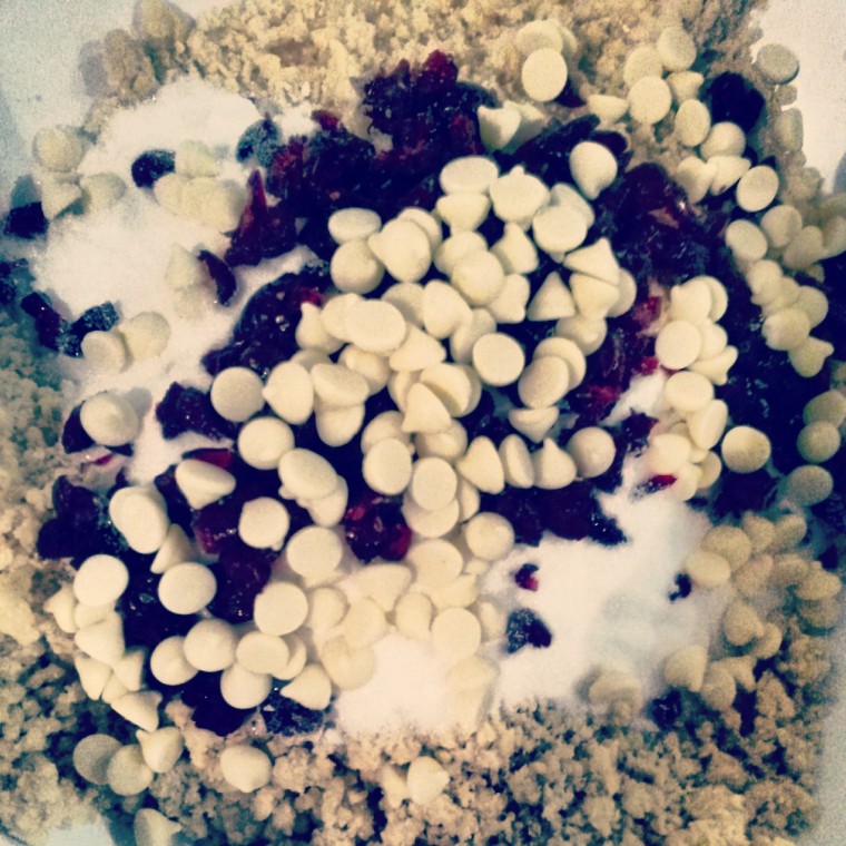 Add the sugar, choc chips and cranberries to the breadcrumb mixture